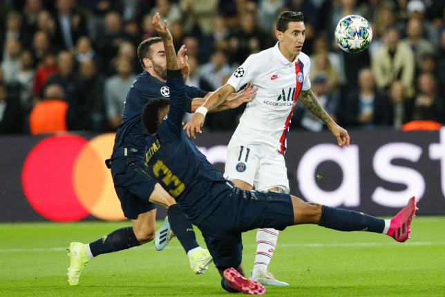 Di Maria has 2 goals as PSG tops Madrid in the Champions League game ...