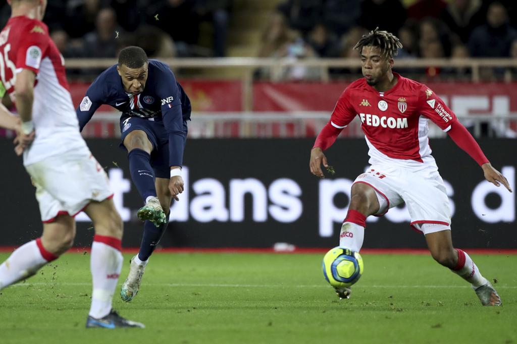 Mbappé scores 2 against his former club as PSG beats Monaco by 4-1 in French League game