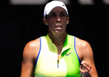 ‘Timid’ Keys overcomes nerves to start title defence