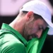Djokovic scrapes into semis after Musetti injury