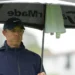 McIlroy sets clubhouse lead at stormy Genesis