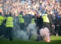 ‘Shameful’ pitch invasion by Celtic and Rangers fans condemned by police