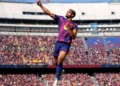 Leaders Barcelona hang on to beat Rayo Vallecano