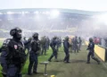 Ligue 1 game abandoned after fans invade pitch at relegated Nantes