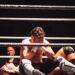 Wrestlers grappling inside the ring (Pexels 29714442)