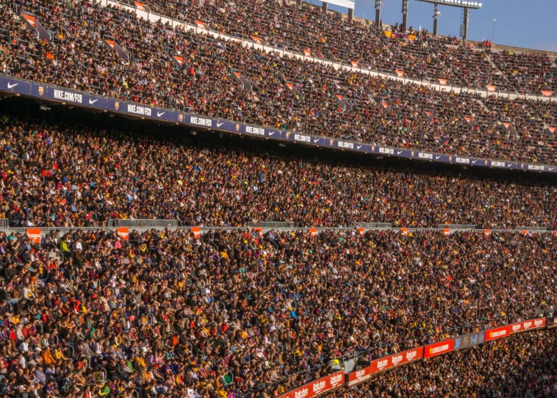 Packed stands at Camp Nou during a football match (Pexels 13069970)