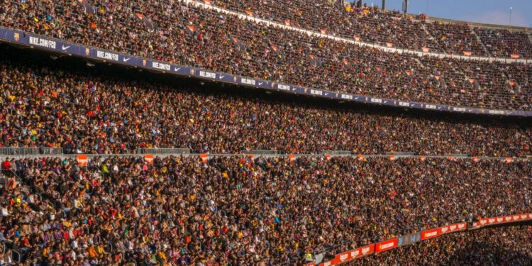 Packed stands at Camp Nou during a football match (Pexels 13069970)
