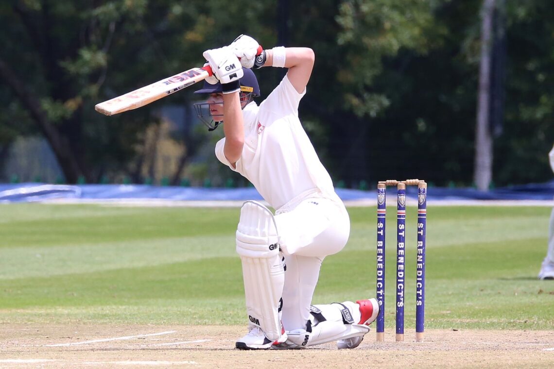 cricket batsman playing a drive