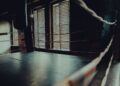 Empty fight ring in a dim gym, Darren Till vs Yoel Romero BKFC 94