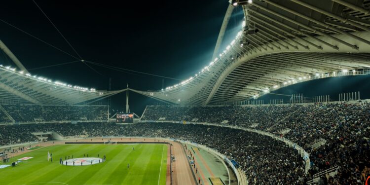 Floodlit football stadium at night (Pexels 30651230)