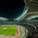 Floodlit football stadium at night (Pexels 30651230)