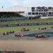 Formula 1 cars racing at Silverstone in front of packed grandstands (Pexels 36920241)
