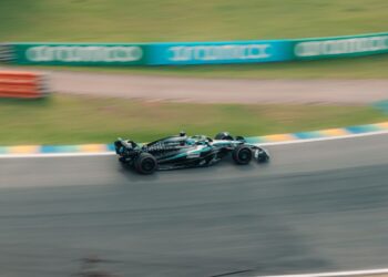 Formula 1 car at speed on track