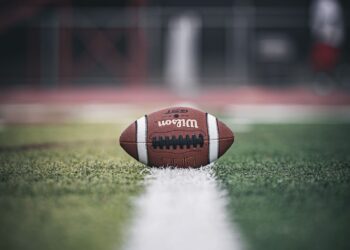 American football on the field yard line, Iowa vs Michigan college football