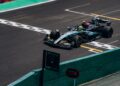 Mercedes Formula 1 car crossing the finish line (Pexels 29252129)