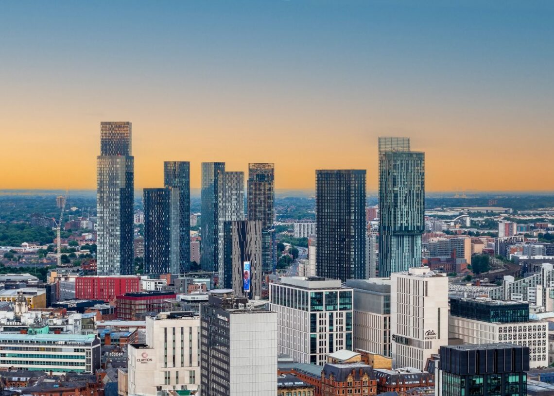 Manchester city skyline at sunset as the Man City 115 charges verdict lands