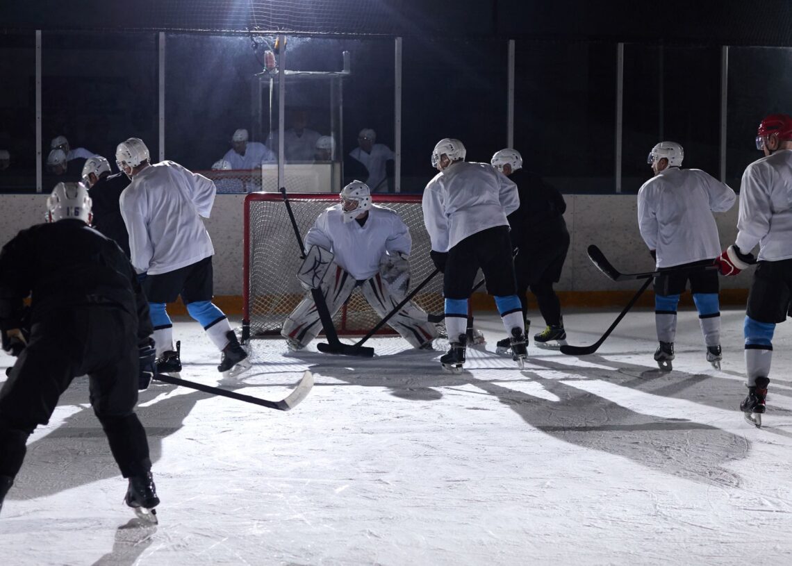 NHL preseason scores: ice hockey players battling for the puck