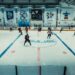 Ice hockey players warming up on an indoor rink, illustrating NHL preseason scores for September 25