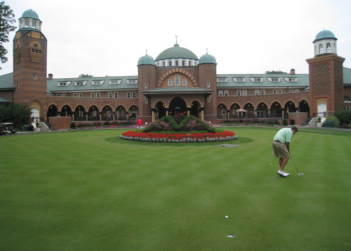 Medinah Country Club clubhouse and putting green, host of the Presidents Cup 2026