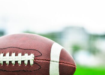 Close-up of an American football on grass, Wisconsin vs Penn State college football