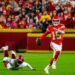 Patrick Mahomes scrambles for the Kansas City Chiefs, who beat the Raiders 30-27