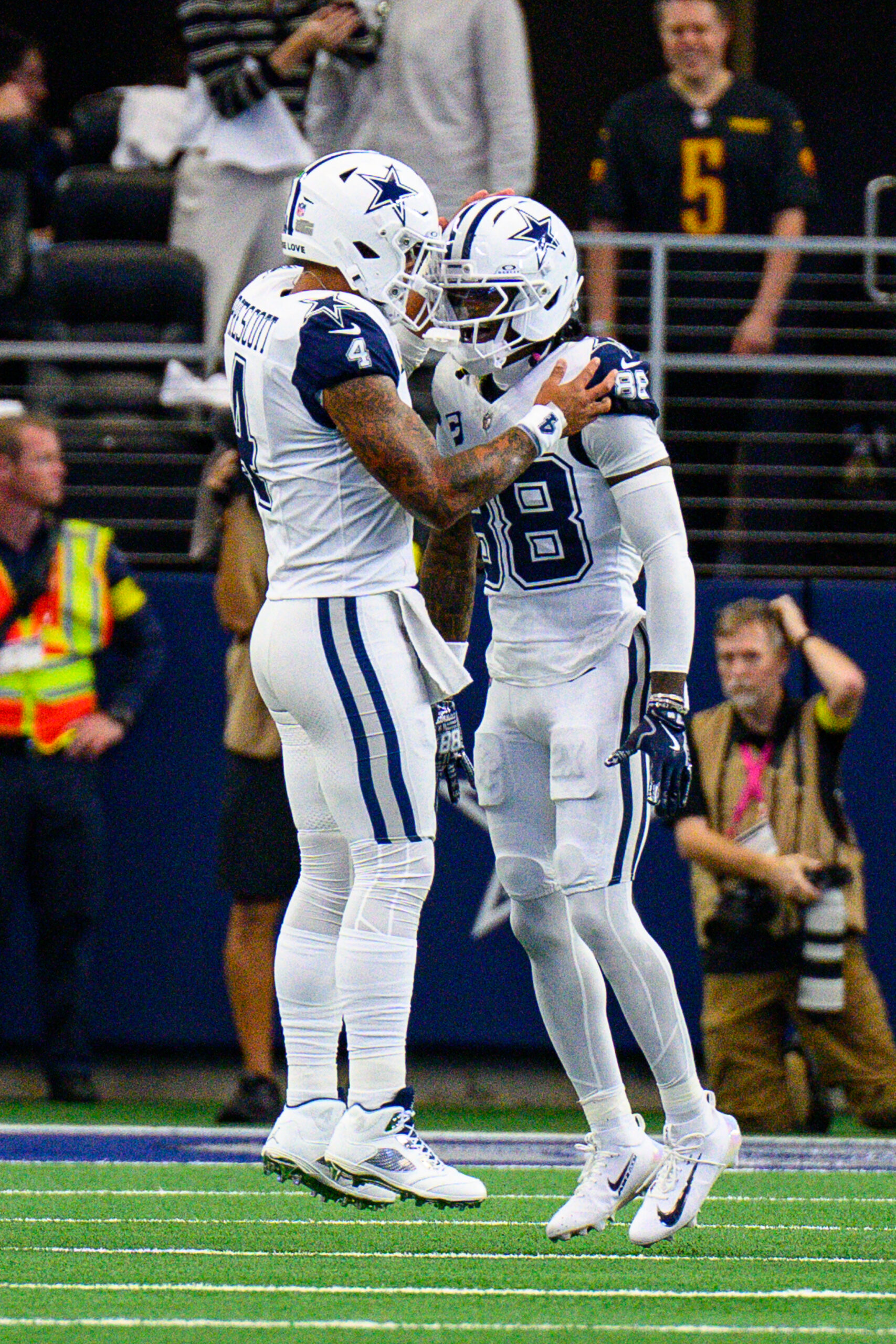 Dak Prescott and CeeDee Lamb celebrate a Cowboys touchdown
