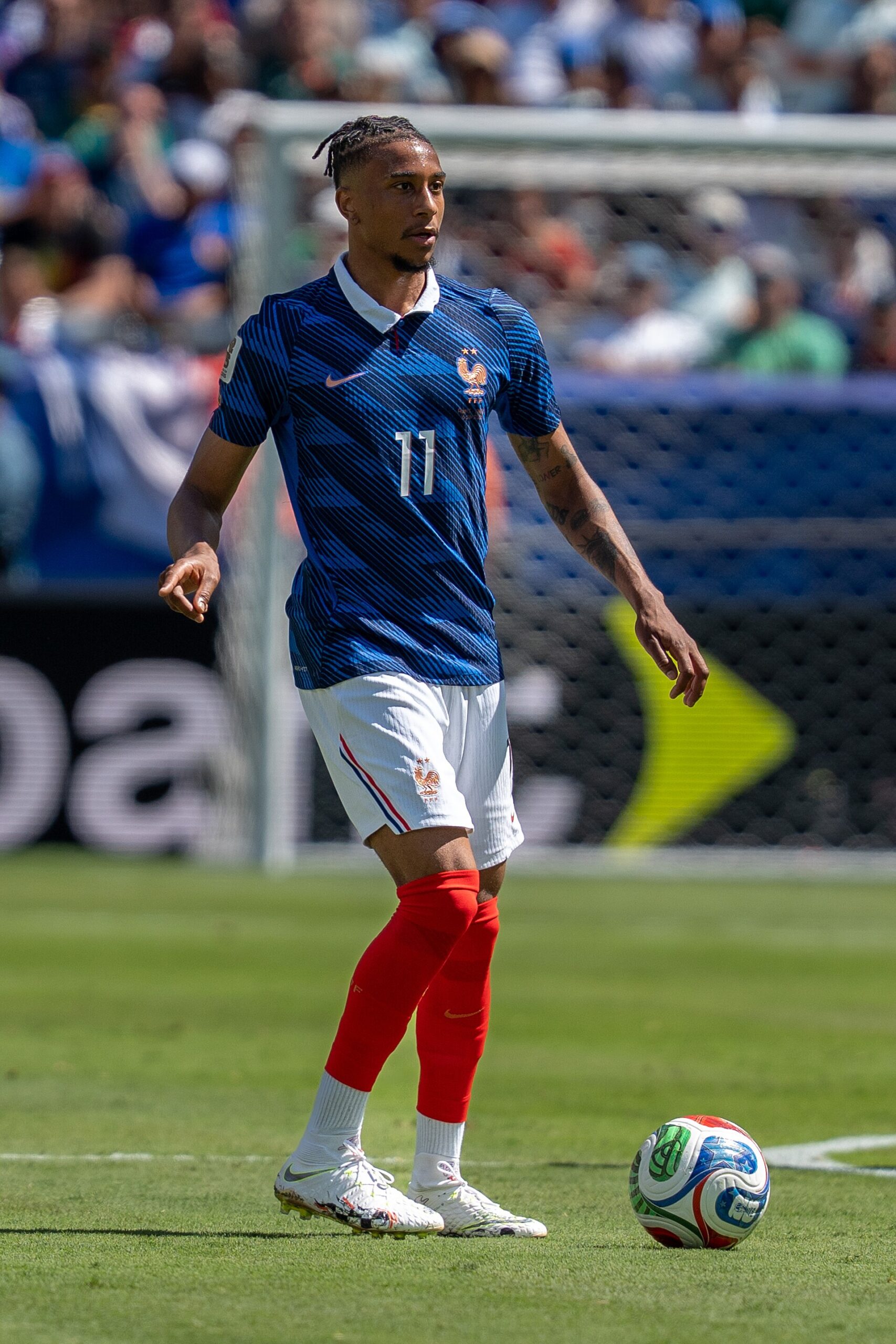 Michael Olise on the ball for France in the Nations League